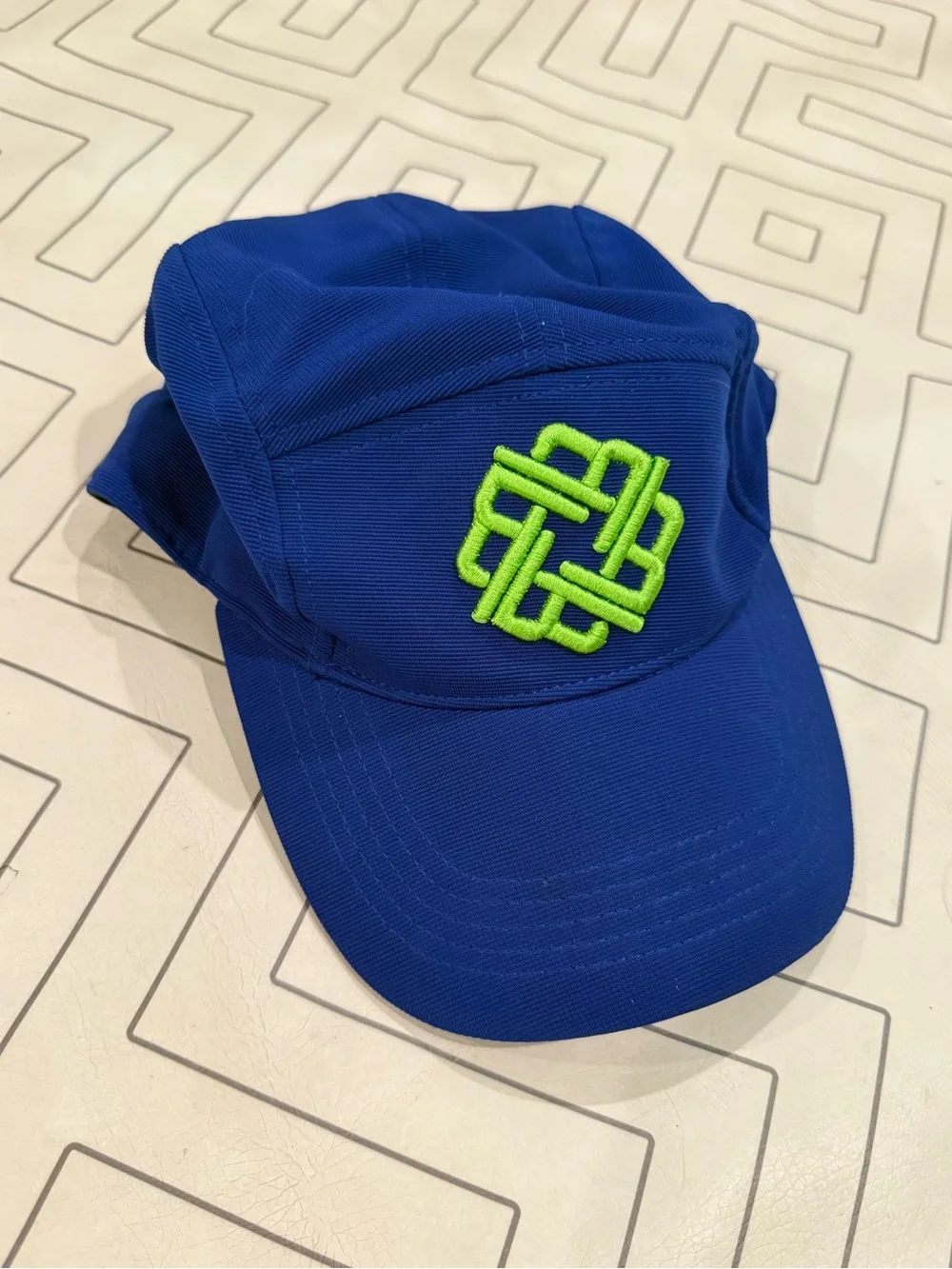 Betenly Blue Athletic Cap with Neon Green Knot Logo
